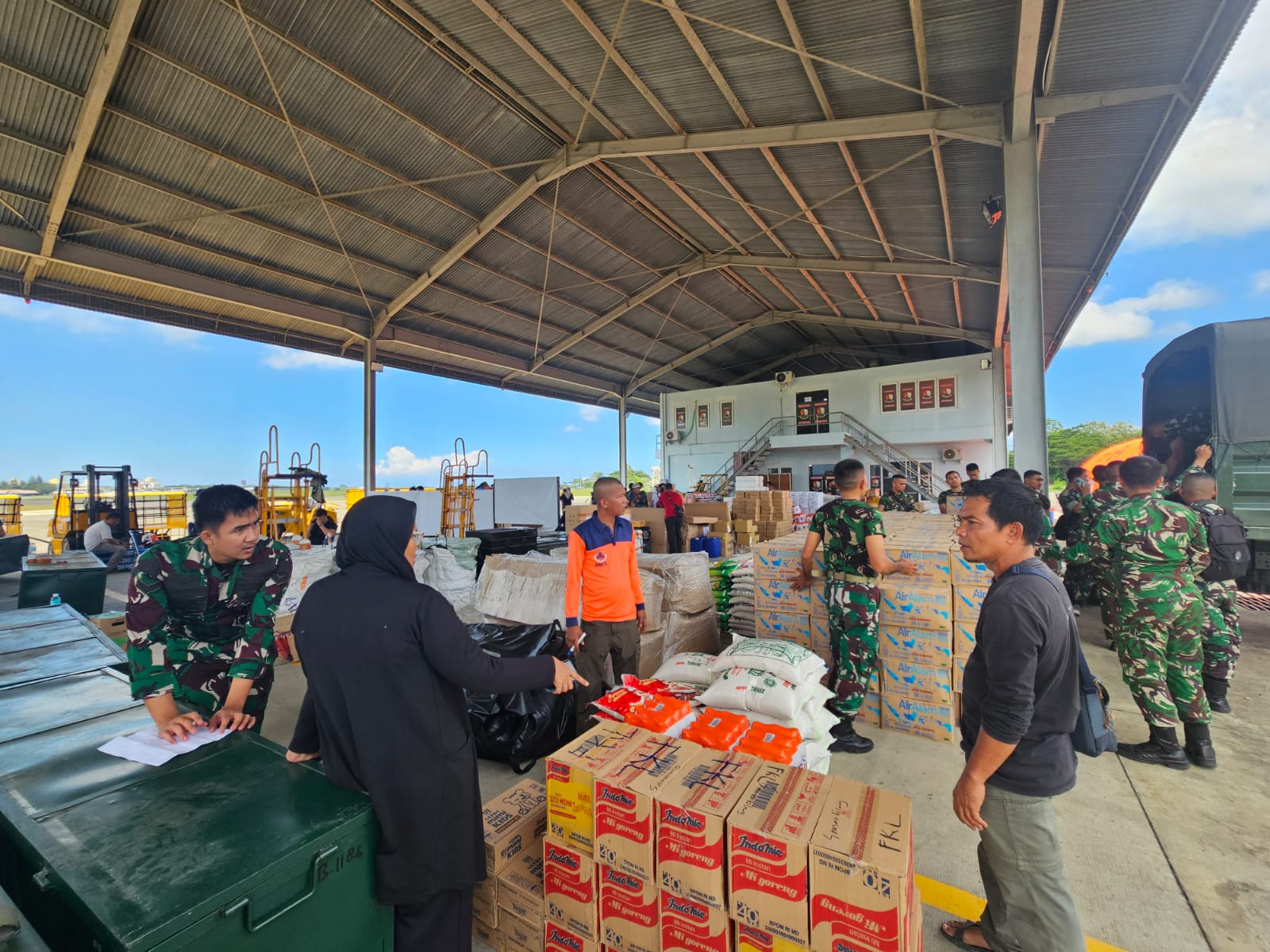 Relief supplies being prepared for delivery to communities affected by Cyclone Senyar in Aceh